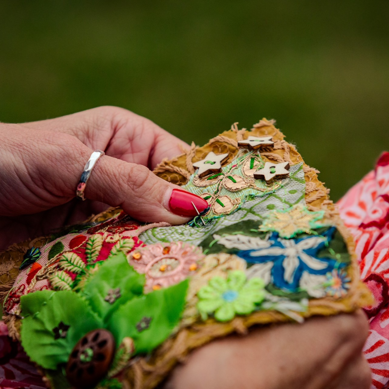 ArtyFartyAnnie hand stitching pieces together